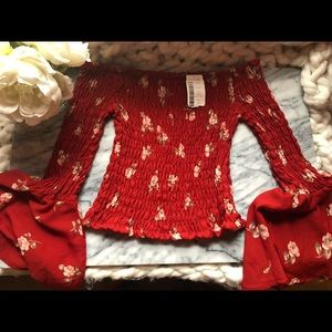 Off the shoulder bell sleeve shirt